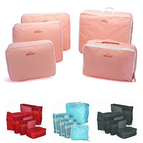 5 piece packing cubes in pink, red, blue and grey