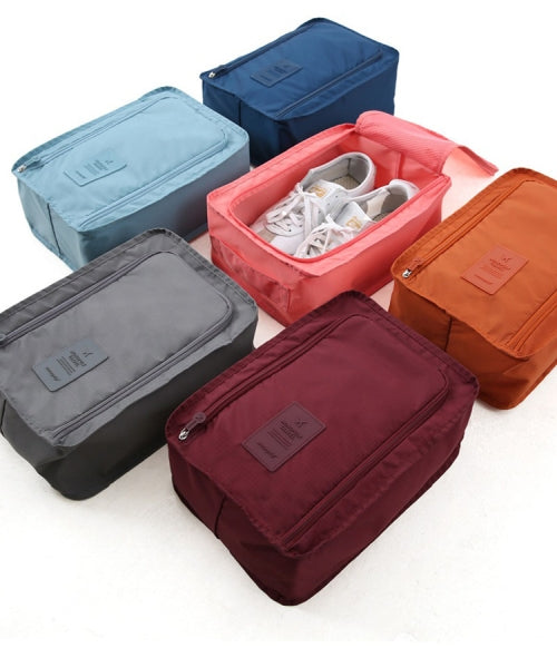 Shoe travel bags in blue, grey, wine and orange colours